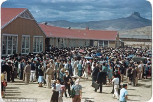 At midday on Sept. 21, 1943, a crowd of about 4,000 people gather at the high school to send off 434 detainees departing for the Tule Lake Segregation Center in California after the government deemed them ‘disloyal’. Photo by Bill Manbo