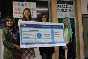 Durya Nadeem (17), Grace Taylor (15), Fitnat Mutlu (19), Dilara Marasil (20)) receiving the Allstate Foundation $2,000 and being informed that they are Finalist for the Peace First Challenge.
