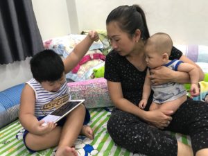 Thuy Huynh with son (left) and nephew
