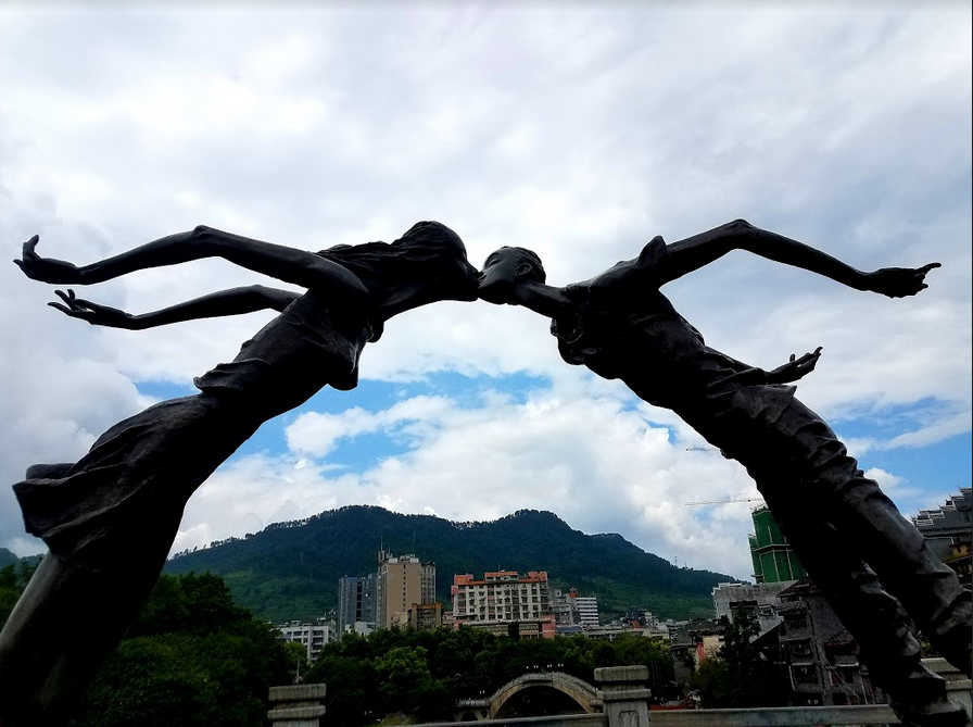 Statue of Couple kissing on Bridge in Jishou