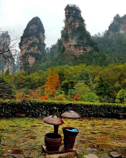 Interesting looking trash cans in front of the beautiful scenery at Zhangjiajie