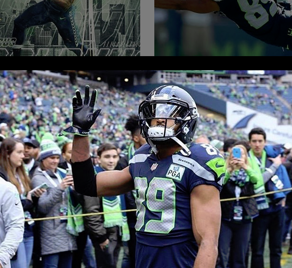 Doug Baldwin waves to fans.