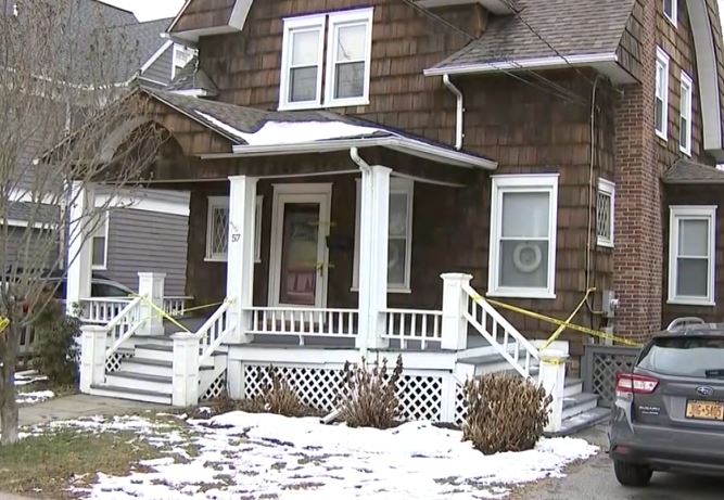 The scene outside the home of Tom Liu where a family of four where found dead 