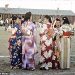 Young women chat at Bon Odori, a dance ritual performed during Obon, a summertime Buddhist festival commemorating one’s ancestors. Photo by Bill Manbo