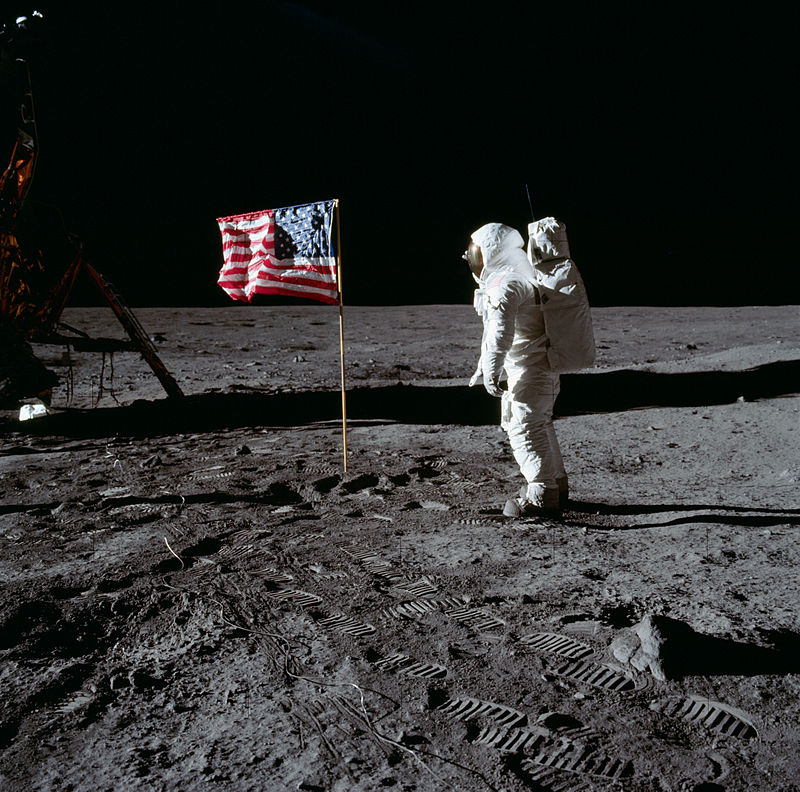 Astronaut Buzz Aldrin salutes the deployed United States flag during an Apollo 11 Extravehicular Activity (EVA) on the lunar surface. Photo taken by astronaut Neil Armstrong