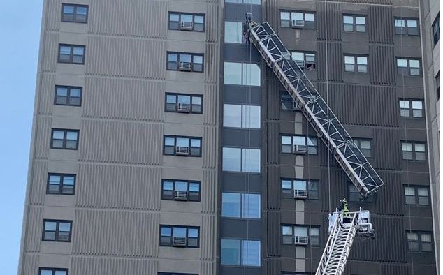 Two window washers dangling from 12 stories rescued in Boston Chinatown
