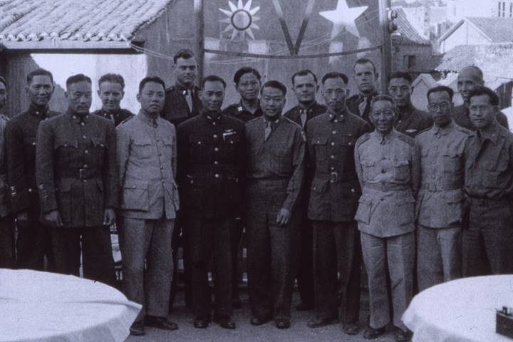 Dr. Julius Sue with American and Nationalist officers at China on V-J Day in 1945.