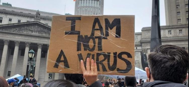 "I am Not a virus" sign at protest in New York 