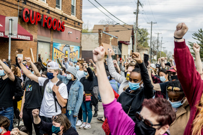 Protesters at Minneapolis Black and Yellow Rally. Photo By Adam Chau For AsAmNews