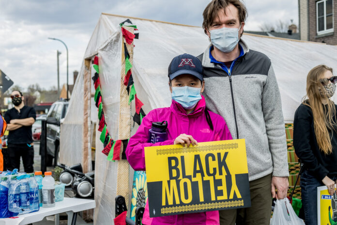 Protesters at Minneapolis Black and Yellow Rally. Photo By Adam Chau For AsAmNews