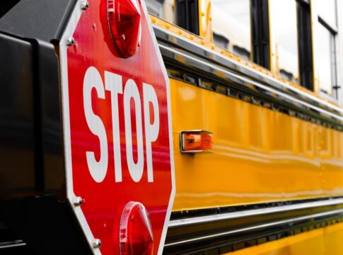 stop sign on side of school bus