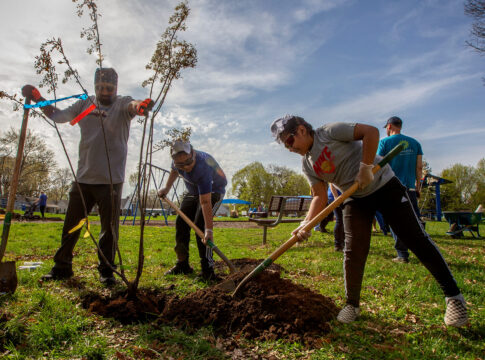 Narinder Johal (left to right) Tarmanjot Johal, and Partaap Johal planted one of eight Autumn Brilliance Serviceberry trees to honor the lives lost at the FedEx shooting in 2021. Over 100 volunteers are planting the other 139 varieties of trees at Arsenal Park, Indianapolis. Keep Indianapolis Beautiful, Inc, and the Eway Foundation of Indianapolis hosted the Great Indy Cleanup & Tree Planting on Saturday, April 23, 2022.