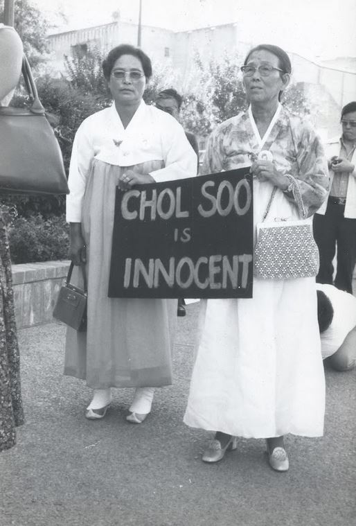 Supporters of Chol Soo Lee included elderly Korean immigrants such as these two women wearing traditional Korean dresses as they demonstrated outside a Stockton, CA courthouse