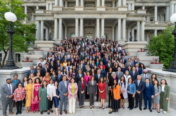 Kamala Harris poses with more than 100 White House staff members who identify as Asian American Native Hawiian or Pacific Islander