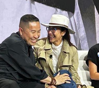 Michelle Yeoh and creative director Phillip Lim of American Born Chinese share a laugh