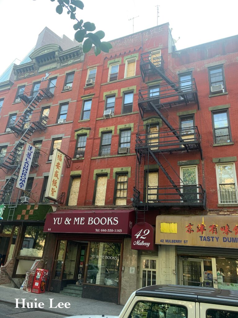 After fire, community rallies to save Yu & Me Books in NYC's