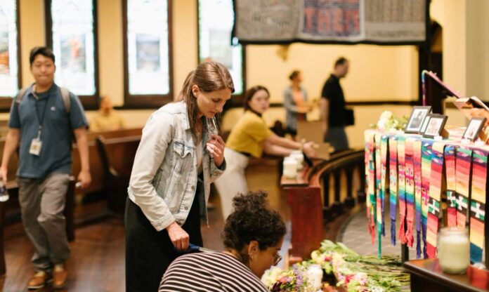 Allen, TX mall shooting vigil at Oak Lawn United Methodist Church in Dallas.