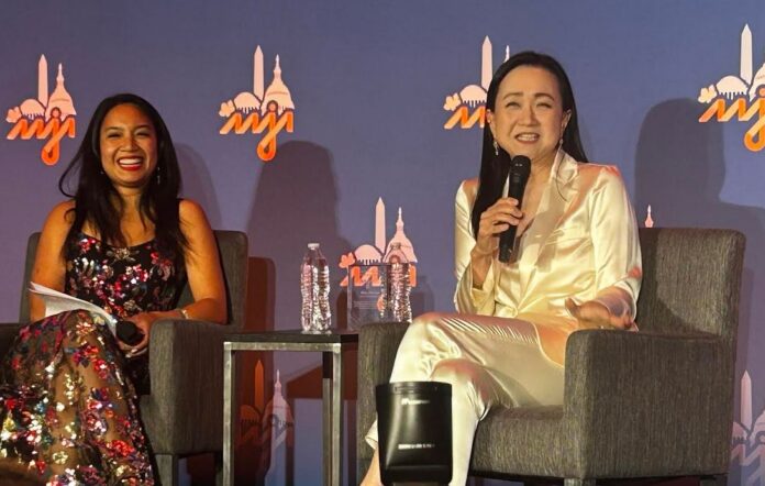 Min Jin Lee and AAJA president Nicole Dungca share a laugh
