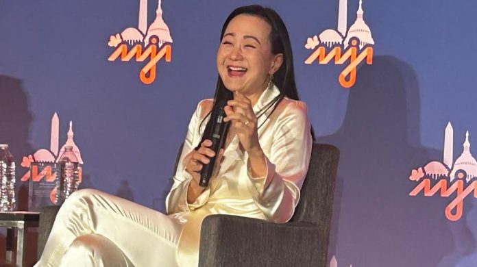 Min Jin Lee shares a laugh on stage