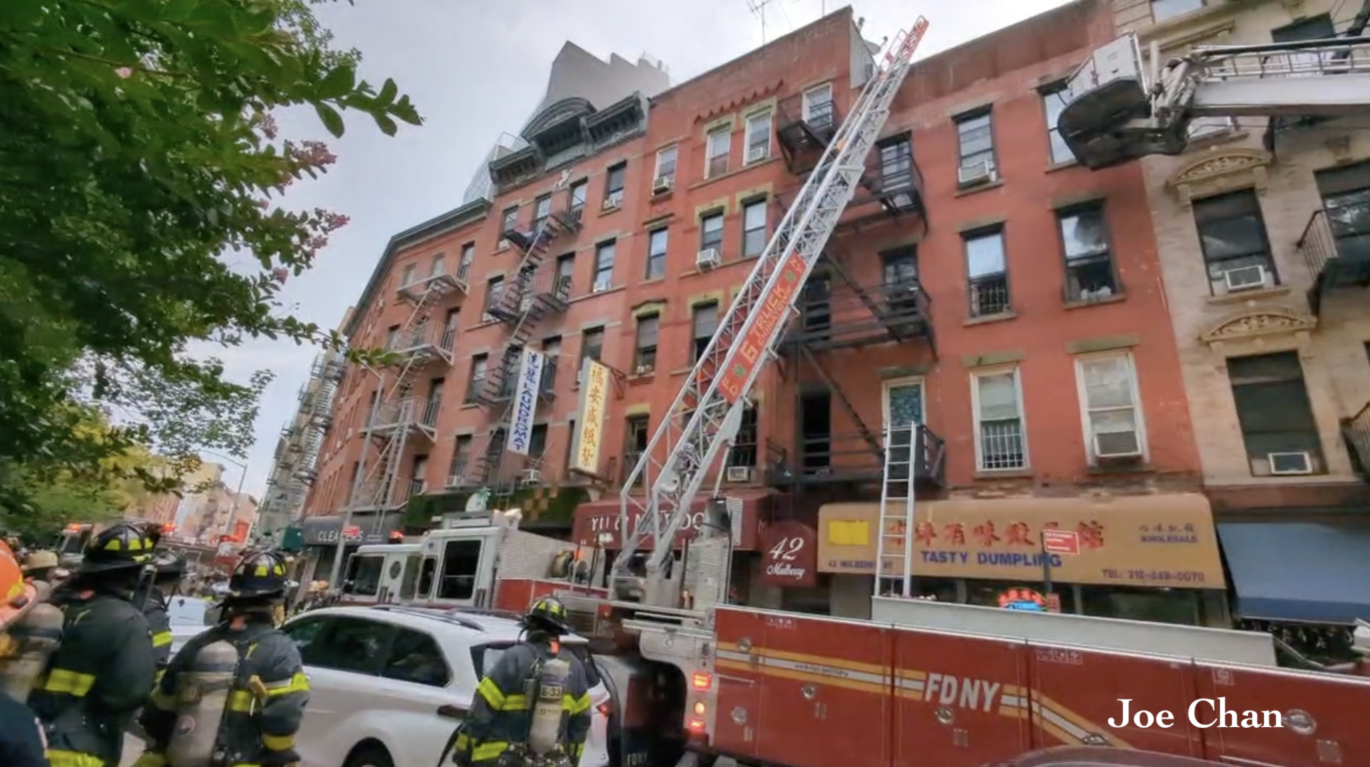 After fire, community rallies to save Yu & Me Books in NYC's