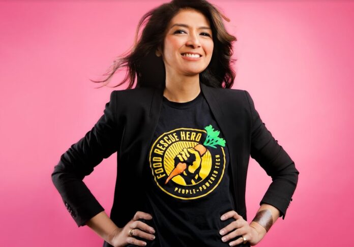Leah Lizarondo wears a food rescue t-shirt with her hands on her hips