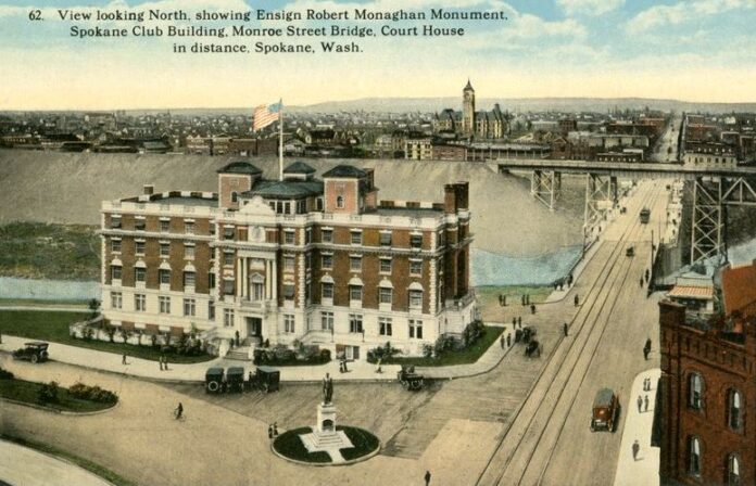 The Robert Monaghan Statue is seen in this postcard in front of the Spokane Club