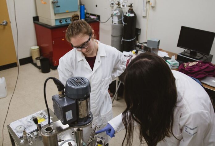 Researchers at Coleman Kronawitter Lab in the Department of Chemical Engineering researching catalysis science and energy conversion applications.