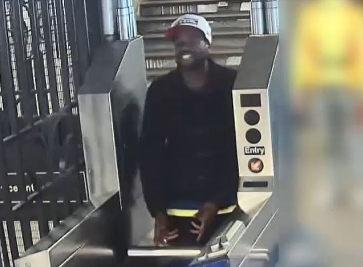 Suspect seen walking through the fare gate is between 30 and 40 years old and has a dark complexion. He is approximately 6 feet tall and 180 pounds and was last seen wearing a black jean jacket, black shorts, white socks, white and black sneakers and a white baseball cap.