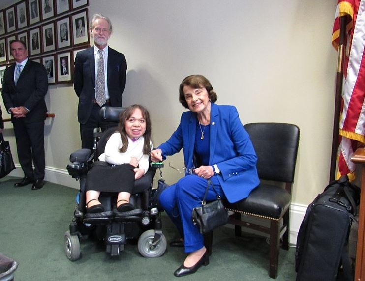 The Senator poses with a constituent 