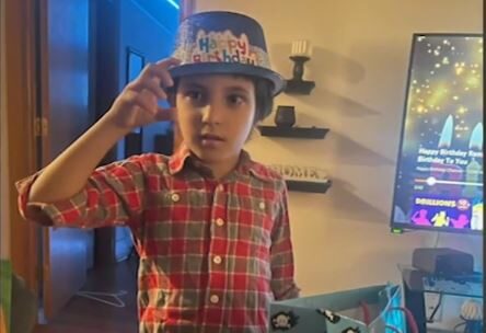 6-year-old Wadea Al-Fayoume wears a celebratory birthday hat