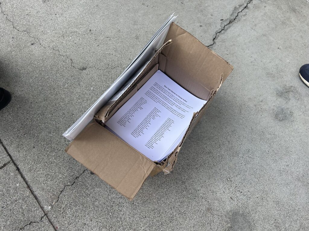 A box containing printed names of over 15,000 people who want climate change to be written into the Indo-Pacific Economic Framework trade agreement, after being rejected from the Moscone Center. Courtesy of Bay Climate Action APEC 2023 IPEF petition