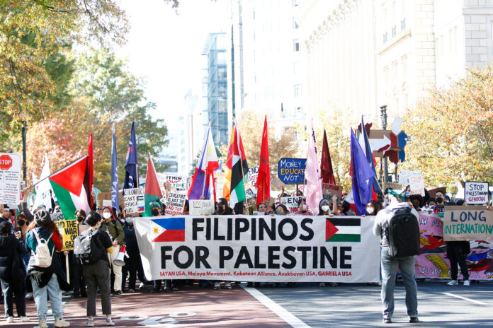 Filipinos marching united in solidarity for Palestine.
