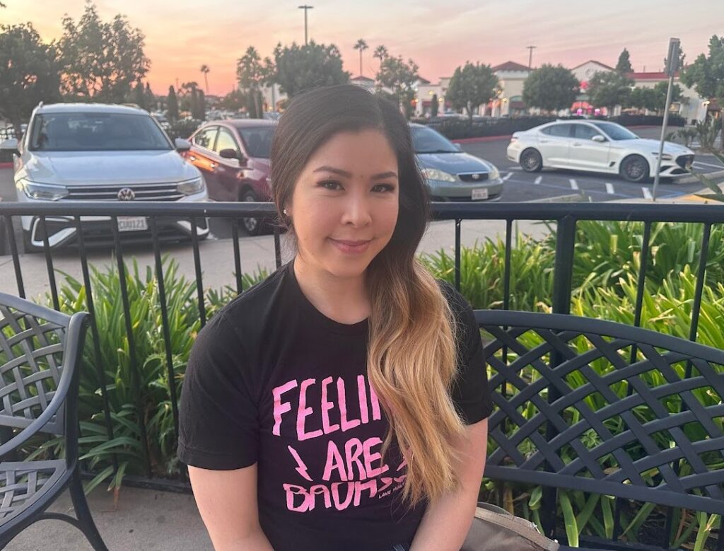 Michelle Moy in a dark colored t-shirt