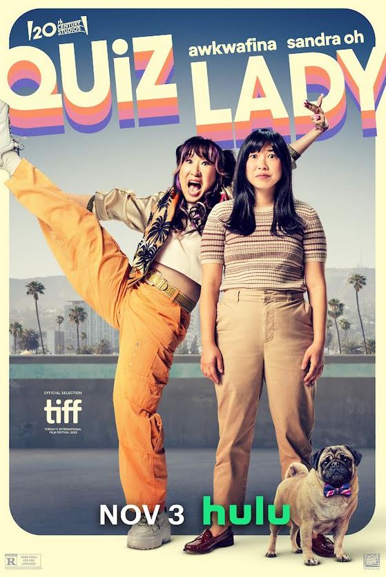 Sandra Oh kicks up her left as Awkwafina stares into space in this Quiz Lady poster