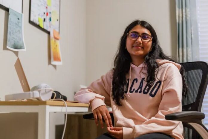 Round Rock High School junior Indira Moparthi studies on her laptop after school