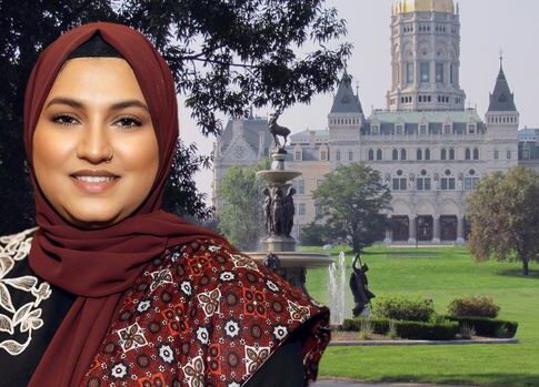 State Rep Maryam Khan is showin with the Connecticut state capitol building in the background