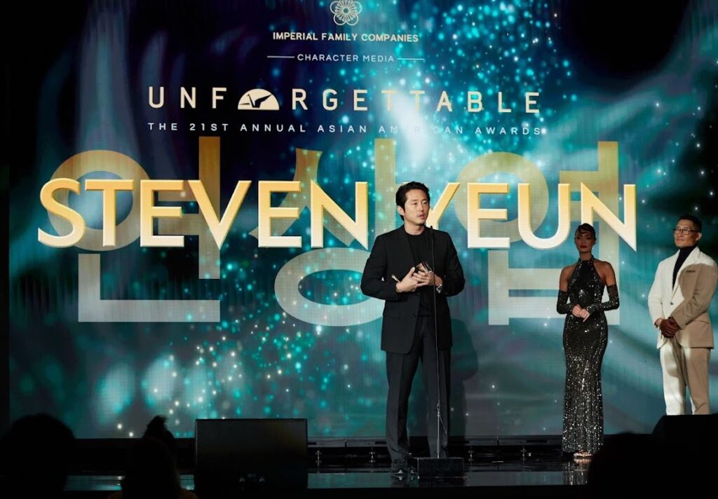 Steven Yeun accepts an Unforgettable Award