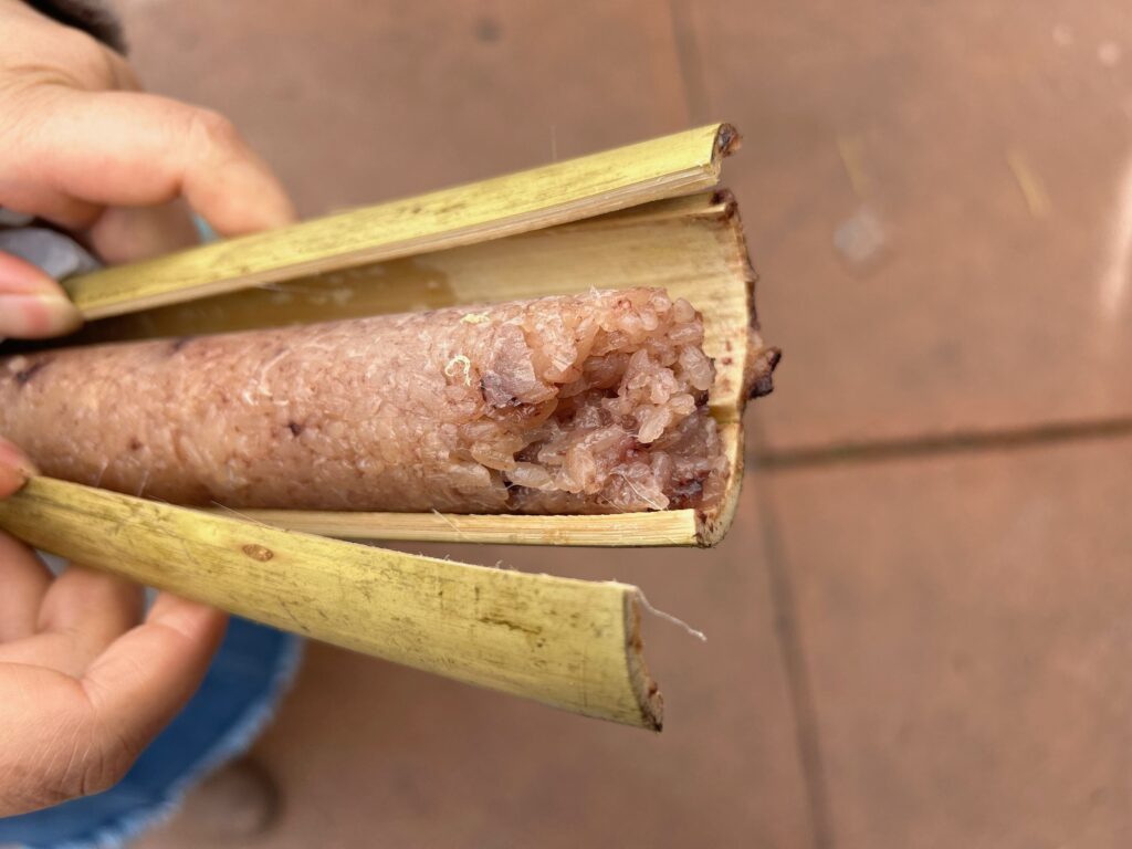 Sticky rice steamed in a bamboo stalk at the Hmong Cultural New Year Celebration. Photo by Jia H. Jung