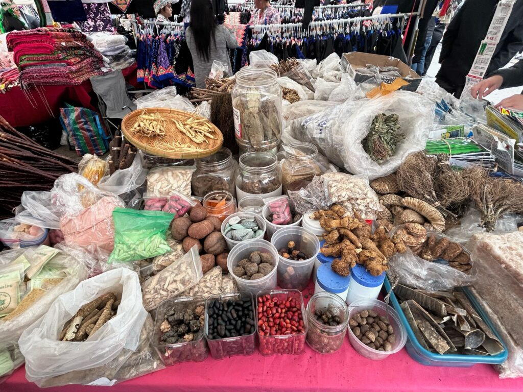 Herbs, spices, and roots of one vendor at the Hmong Cultural New Year Celebration. Photo by Jia H. Jung