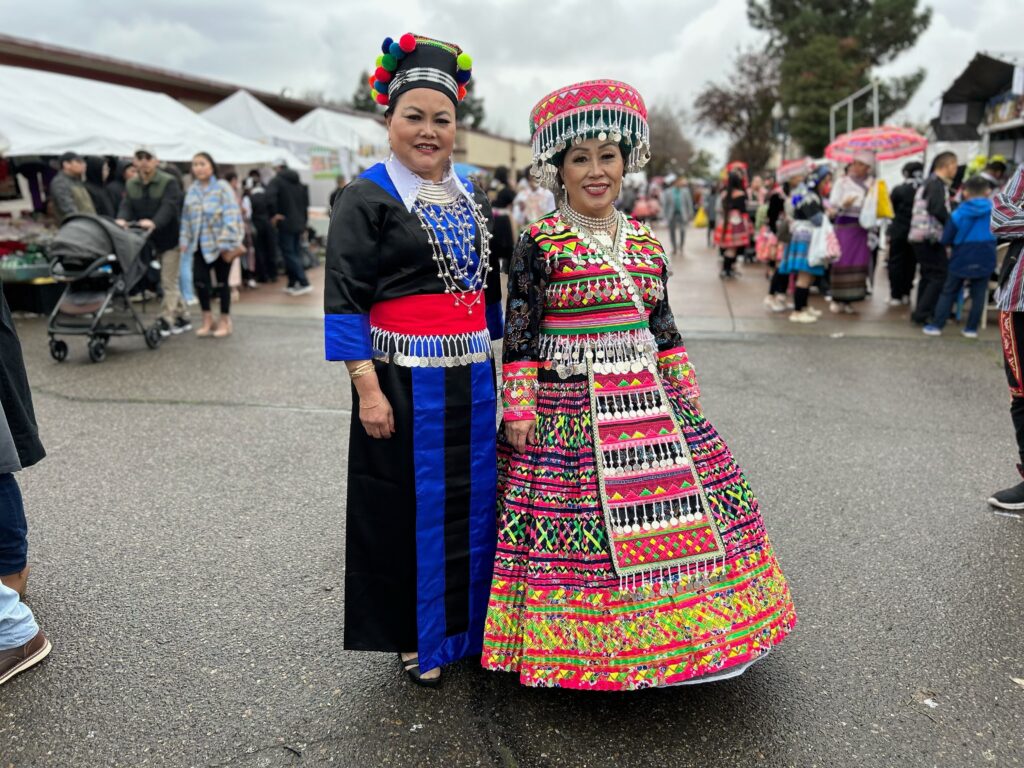 Women wearing the clothing of their respective Hmong clans at the Fresno Hmong Cultural New Year Celebration. Photo by Jia H. Jung