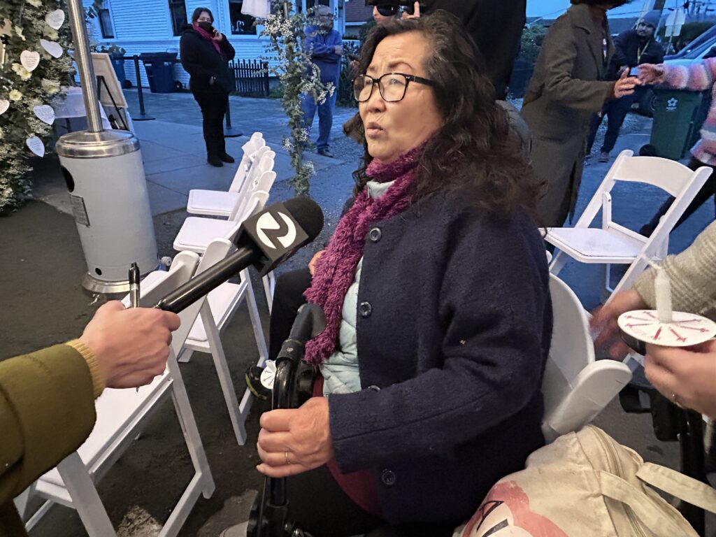 Wang Ying Ze (王英则) answered questions from the media before the memorial program began. Corazón del Campesino Half Moon Bay mushroom farm shooting memorial. Jan. 23, 2024