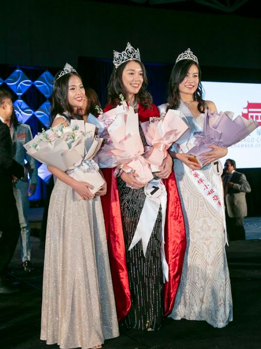 Eleanor Kang is seen here in the center with second runner up, Irene Lo, left , and Angela Kang, first runner up, right.