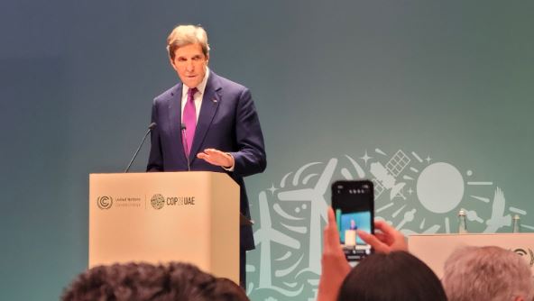 The former US Climate Envoy John Kerry speaking at a press conference at the 2023 UN Climate Conference of Parties (COP28). 