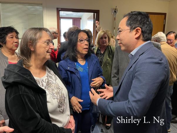Andy Kim talks to constituents while opening a new office in 2023