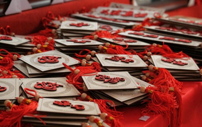 White and Red Lucky charm on Red Table