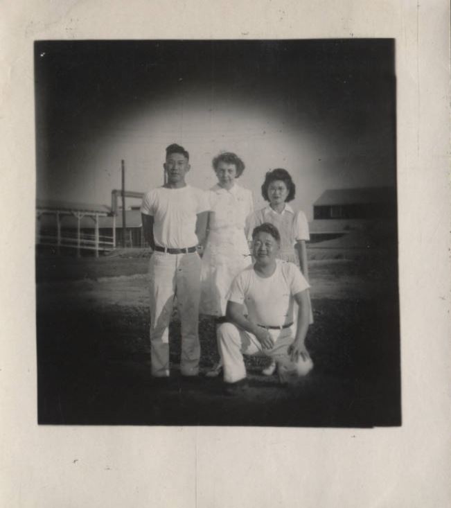 Hiroshi Takemoto is in the foreground with other hospital staff. 