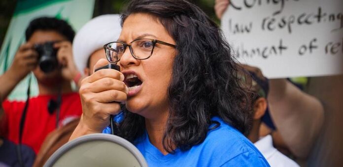 Rashida Tlaib speaks to supoorters at a rally