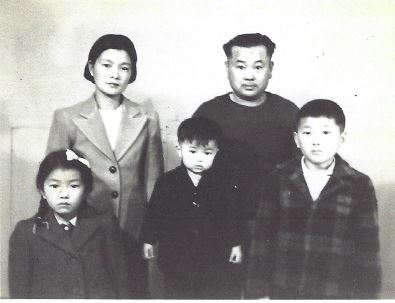 From George Nakano family photo album. Shigeko, Tosh and George Nakano in front row. Parents Sumi and Shigeto in the rear