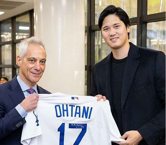 US ambassador to Japan Rahm Emanuel with Shohei Otani, holding Ohtani’s Los Angeles Dodgers baseball jersey.