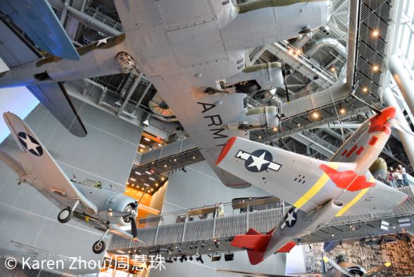 Aircrafts of various sizes hang above the Boeing Center where ceremony was held.